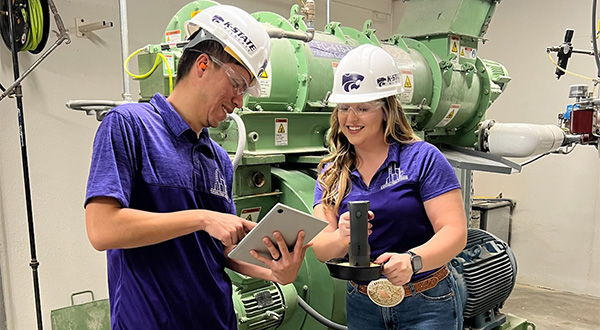 students in feed mill