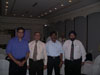 JPEG image of speakers in Delhi presentation.
